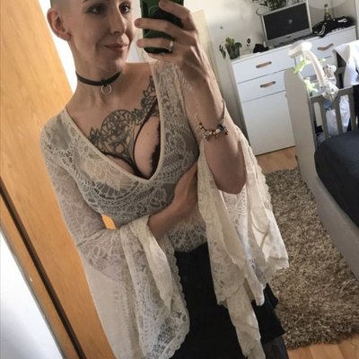 Bald inked mum