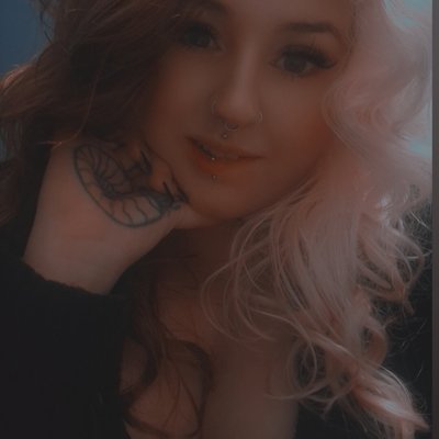 TheGirlWithTheRacoonTattoo