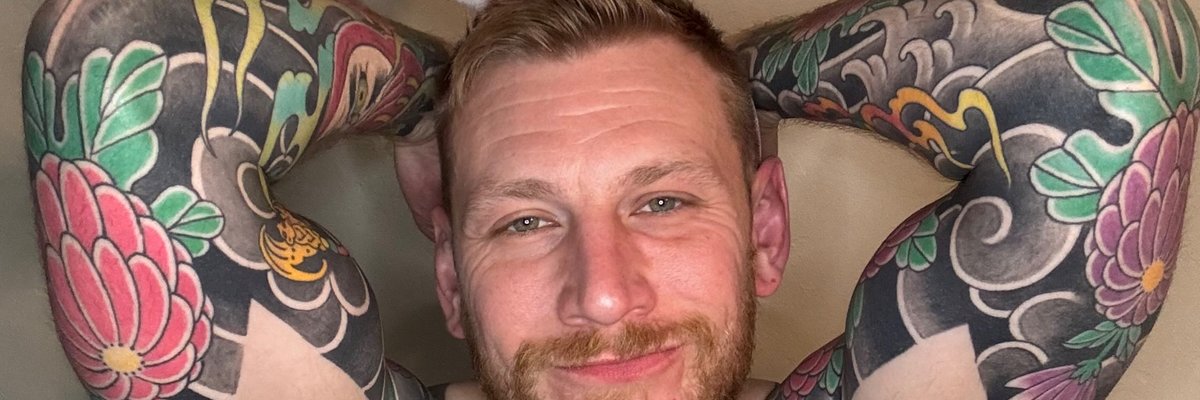 Onebig_tattoo_&_wife cover